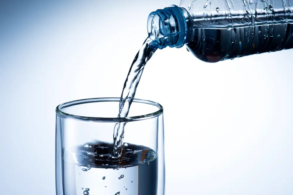 water pouring into a glass
