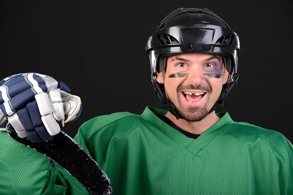 Hockey Player With Lost Tooth